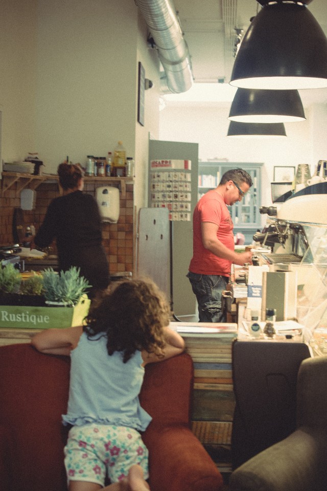 Khalid and Najat prepare and tidy up while their little watches
