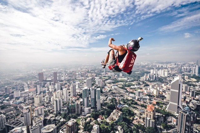 Jill jumping over Kuala Lumpur, Malaysia. Photo courtesy of Sarifhuddin Abdul