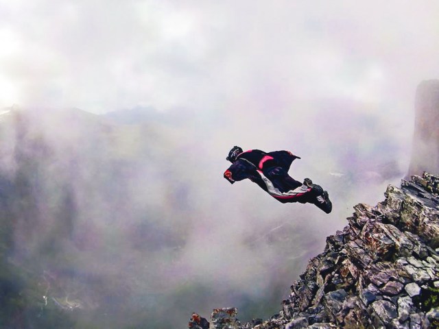 Jill jumping over an undisclosed location in Europe